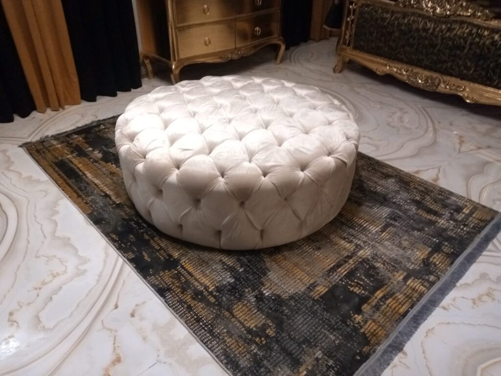 ROUND TUFFTED OTTOMAN